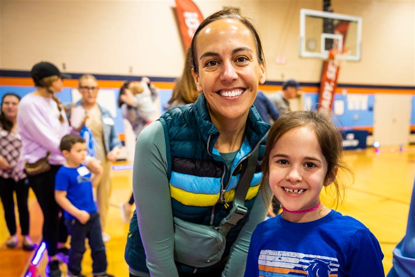 Students and families participate in a fun run
